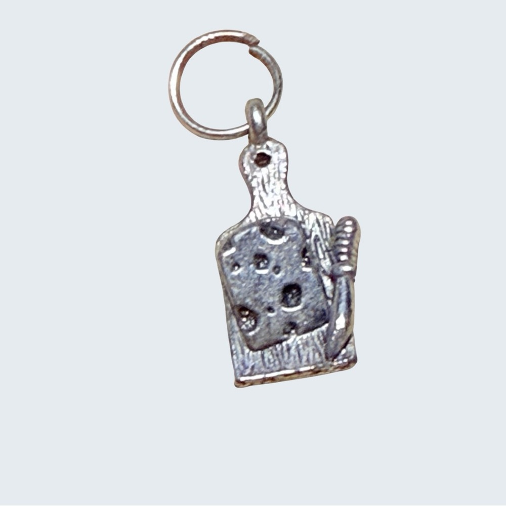 Source Unknown Silver Cheese keychain